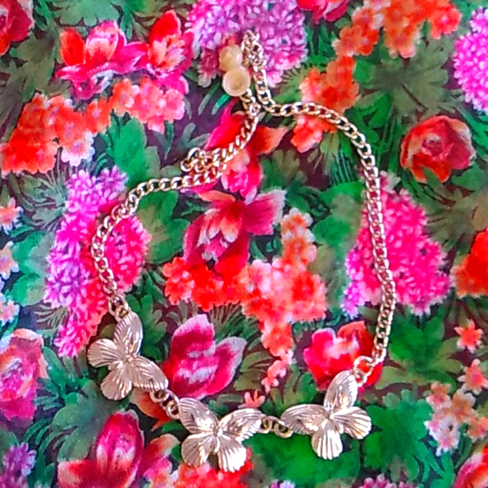 Gold butterfly necklace